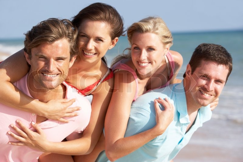 Group Of Friends Enjoying Beach Holiday