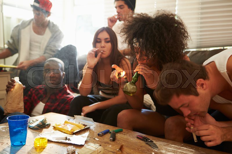 Gang of young people taking drugs